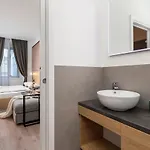 Deluxe & 